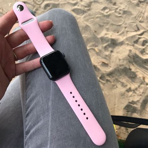 apple watch light pink band.